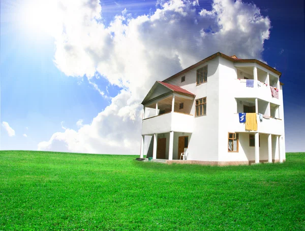 stock image Nice house on green field