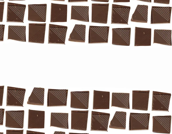 Chocolate pieces background — Stock Photo, Image