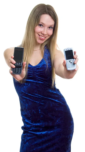 Красивая девушка с двумя телефонами — стоковое фото