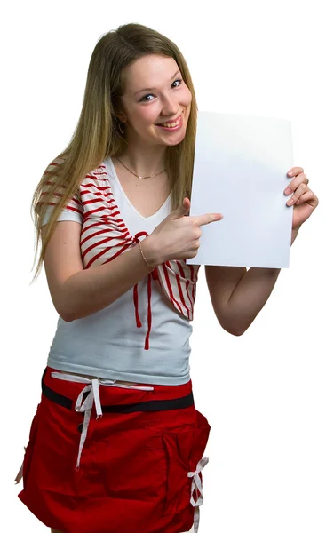 Girl shows empty sheet of a white paper — Stock Photo, Image