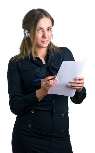 Mulher em fones de ouvido com caneta — Fotografia de Stock