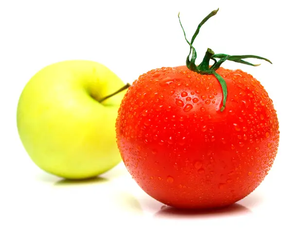 Manzana amarilla y tomate — Foto de Stock
