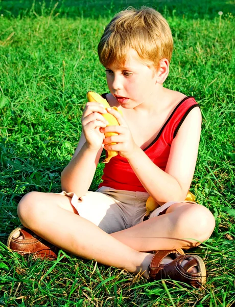 Boy with banana — Stock Photo, Image