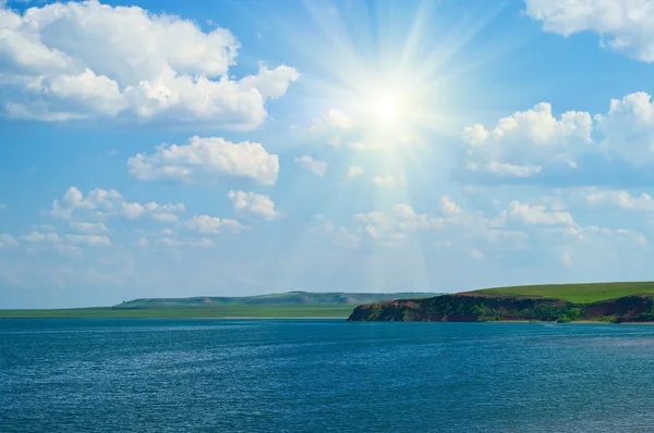 stock image Quiet water of lake and cloudy sky