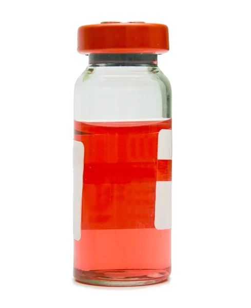 Ampola com um medicamento vermelho — Fotografia de Stock