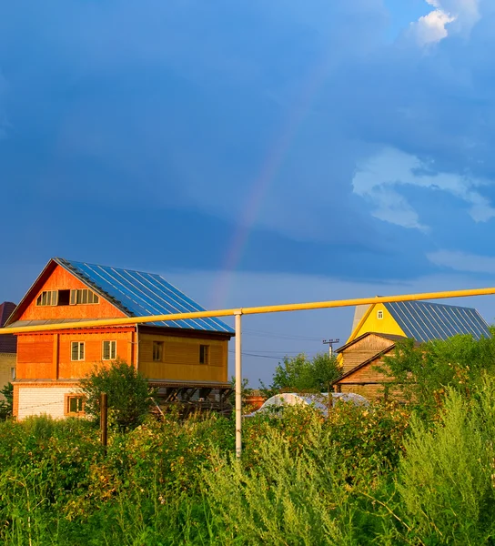 Landskap med regnbue – stockfoto