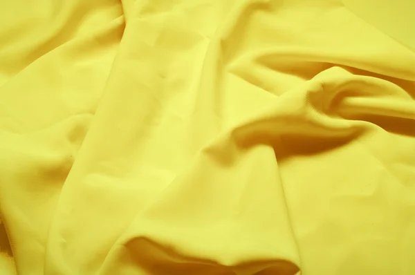 Tecido de seda amarelo — Fotografia de Stock