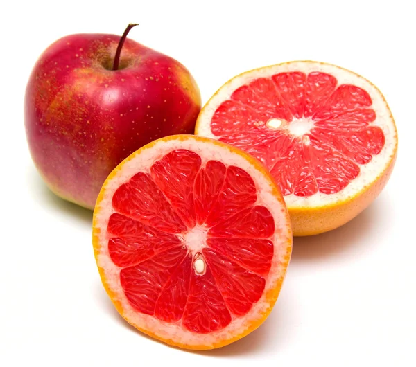 Грейпфрут и красные яблоки — стоковое фото