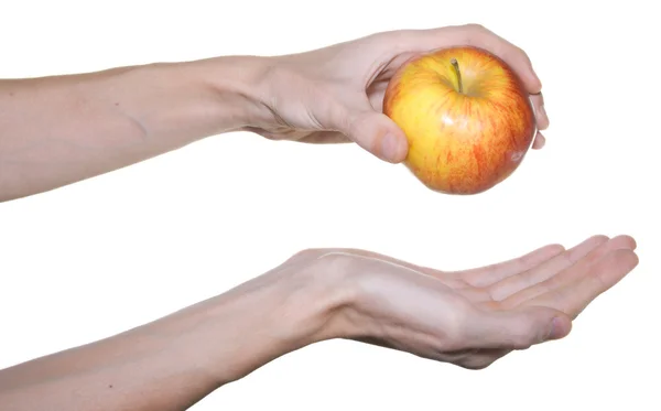 Czerwone jabłko w męskiej dłoni — Zdjęcie stockowe