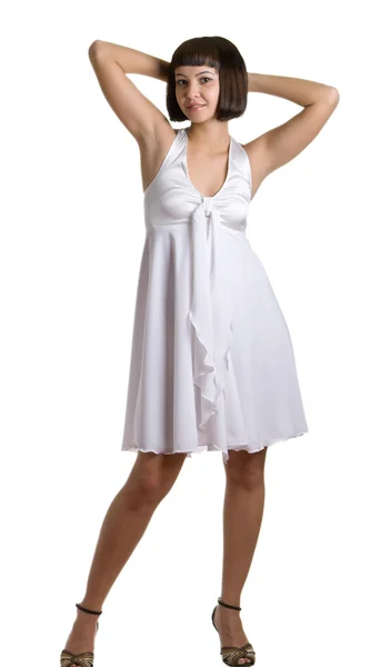 Vacker flicka i en vit klänning — Stockfoto