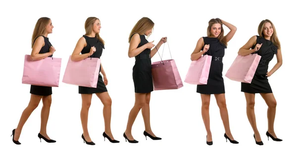Girls in black dress with a pink bag — Stock Photo, Image