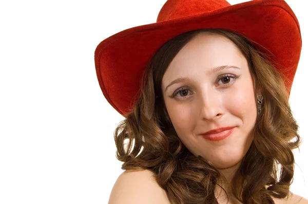 Vacker flicka i en röd hatt — Stockfoto