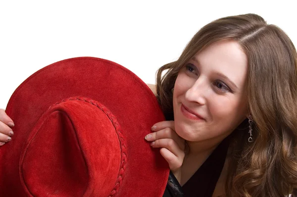 Krásná mladá dívka s red hat — Stock fotografie