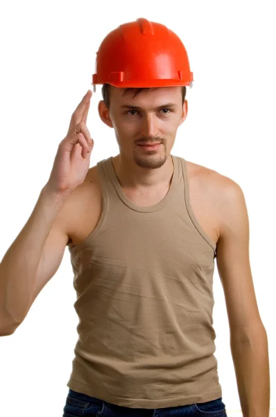 Trabalhador em um capacete vermelho — Fotografia de Stock