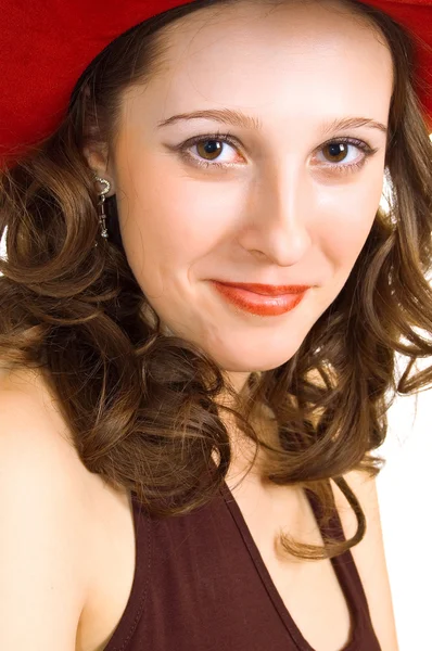 Beyaz üzerine kırmızı şapkalı kız — Stok fotoğraf