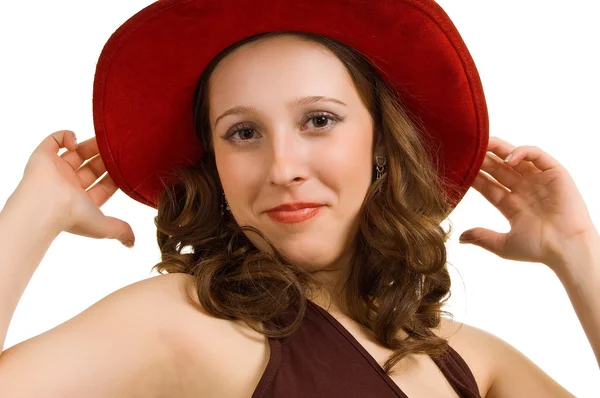 Beautiful girl in a red hat — Stock Photo, Image