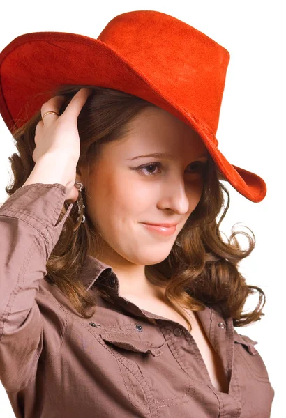 Mladá dívka v červeném klobouku — Stock fotografie