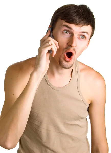 Молодые удивленные мужчины с сотовым телефоном — стоковое фото