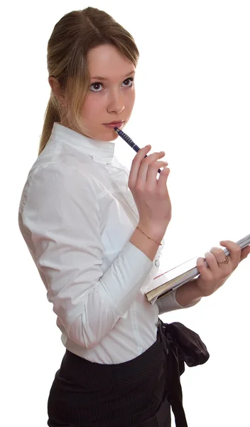 Young girl with pen and sheet of paper — Stock Photo, Image