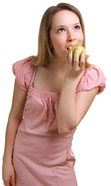 Mooi meisje eet een groene appel — Stockfoto