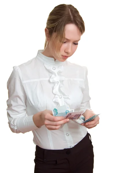 Serious girl considers money — Stock Photo, Image