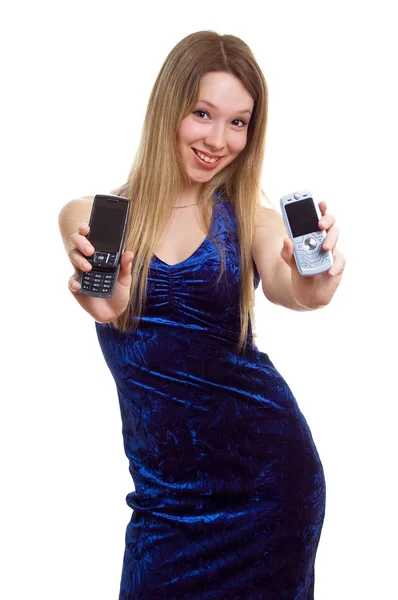 Meisje in blauwe jurk met twee cellular — Stockfoto