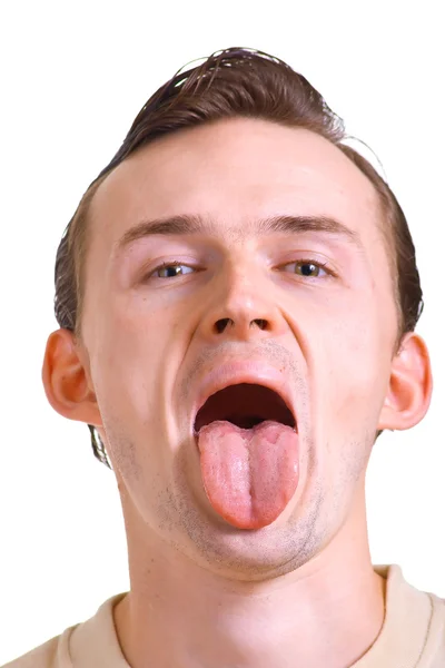 Young man with put out a tongue — Stock Photo, Image