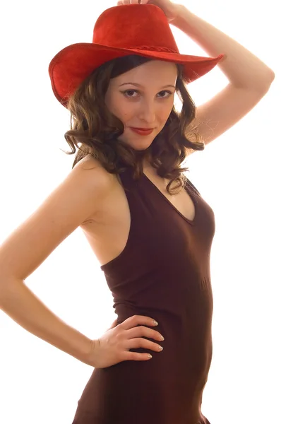 Dziewczyna w czerwony kapelusz i sukienka brązowy — Zdjęcie stockowe