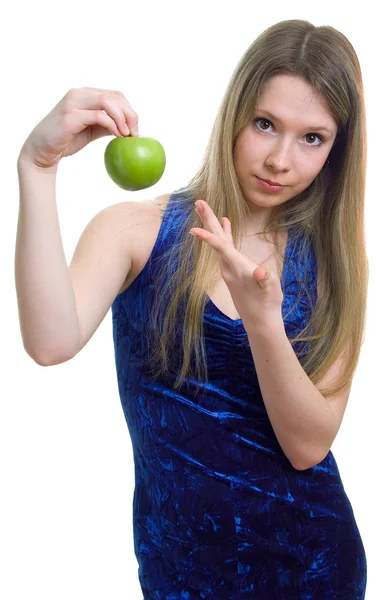 Girl in blue dress with a green apple — Stock Photo, Image