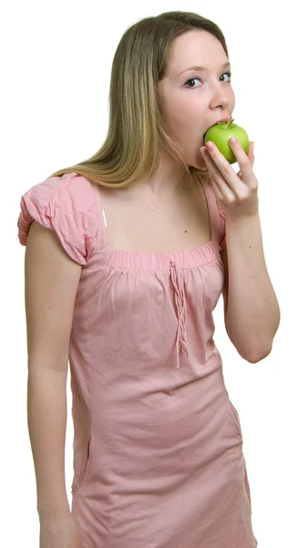 Ragazza mangia una mela verde — Foto Stock