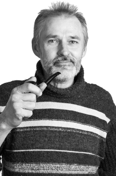 Adult man with a pipe in a hand — Stock Photo, Image