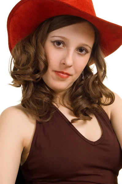 Young beautiful girl in a red hat — Stock Photo, Image