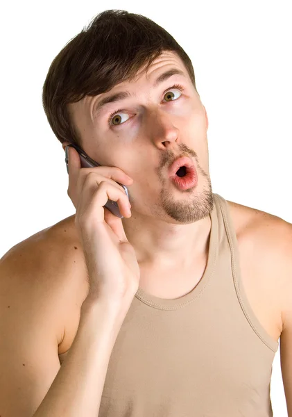 Giovani uomini sorpresi con il telefono cellulare — Foto Stock