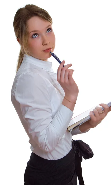 Jeune fille avec stylo et un livre — Photo