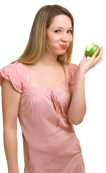Mädchen isst einen grünen Apfel — Stockfoto