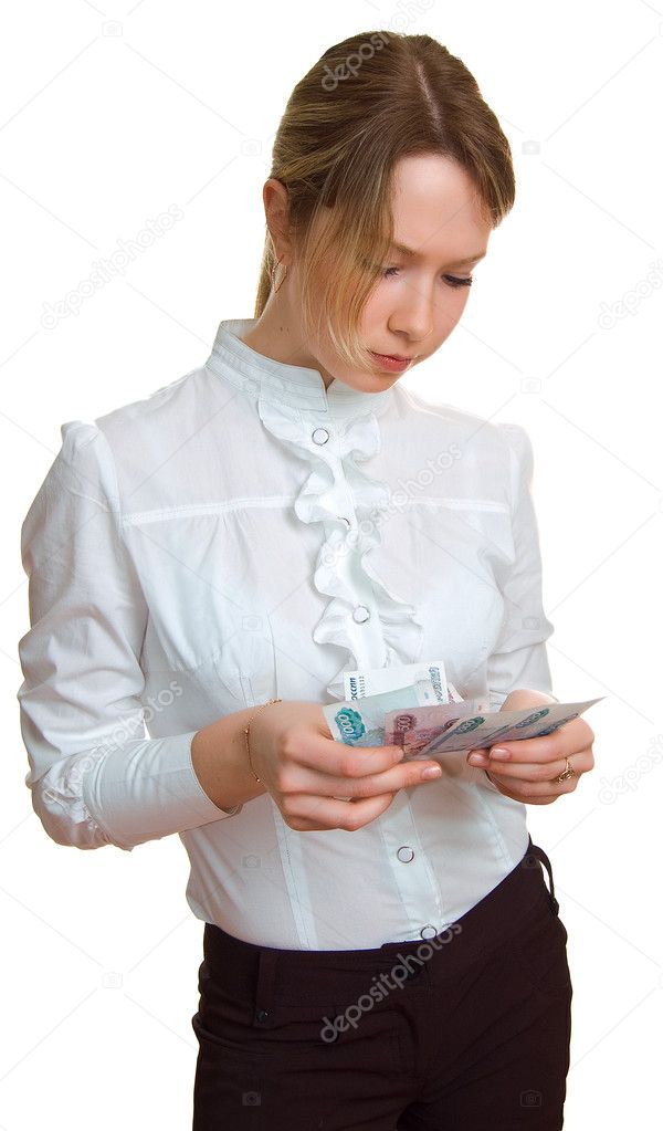 Young serious girl considers money