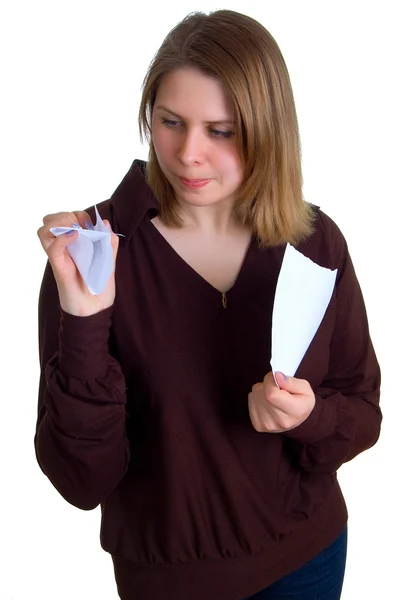 Vrouwen breekt een papier — Stockfoto