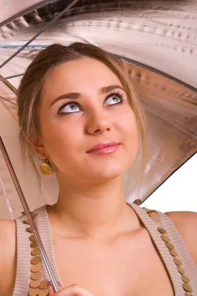 Young women with a silver umbrella — Stock Photo, Image