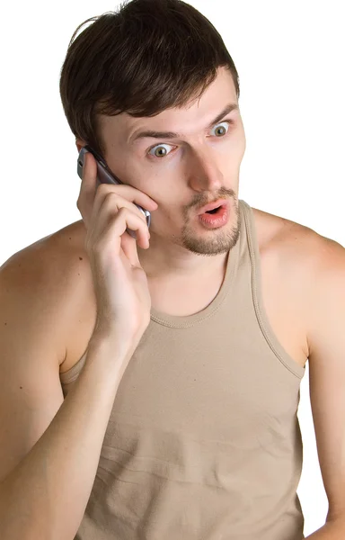 Young shocked men with cellular phone — Stock Photo, Image
