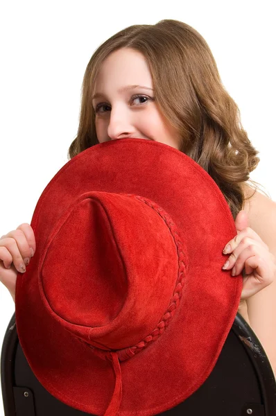 Испуганная девушка в красной шляпе — стоковое фото