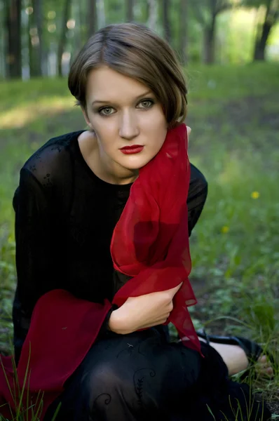 Frauen mit rotem Schal — Stockfoto