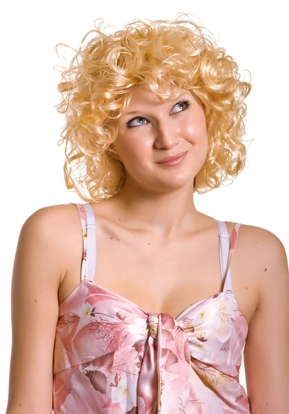 Ung blond flicka i en rosa klänning — Stockfoto