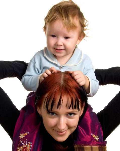 Giovani donne con un bambino piccolo sulle mani — Foto Stock