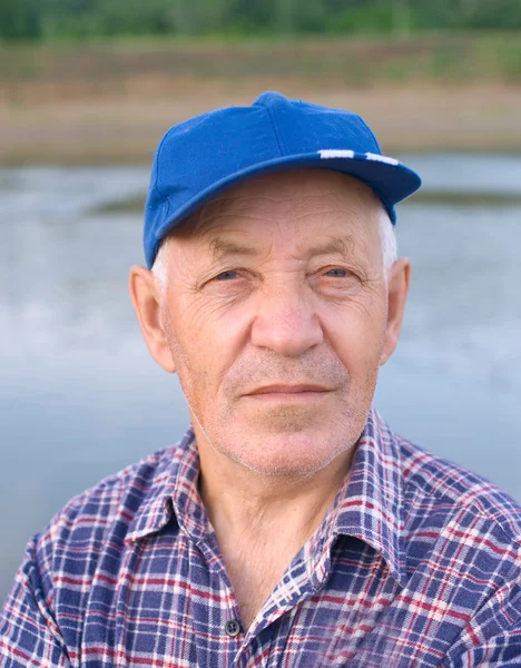 Elderly man in cap — Stock Photo, Image