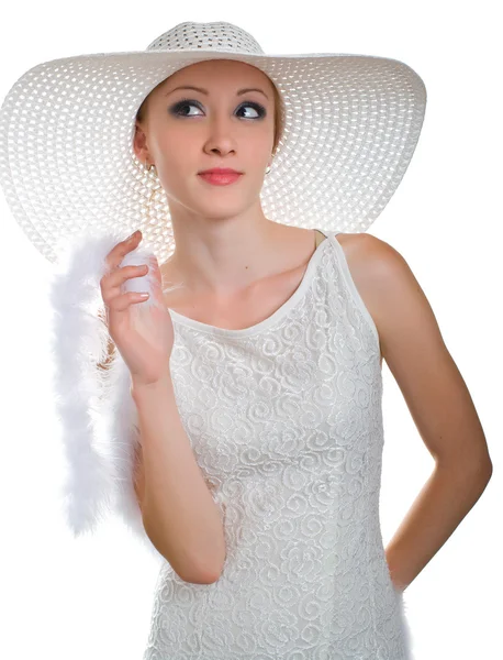 Ragazza sorridente in cappello bianco, vestito e boa — Foto Stock