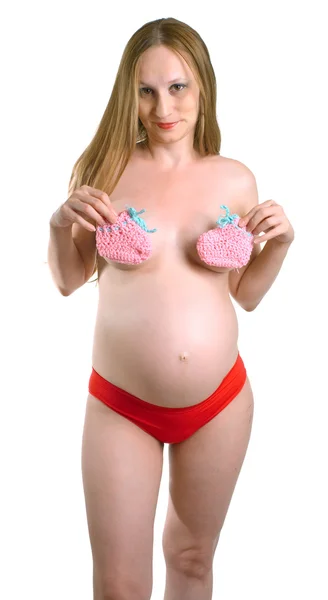 Γυμνές γυναίκες έγκυες με τις παντόφλες του μωρού — Φωτογραφία Αρχείου