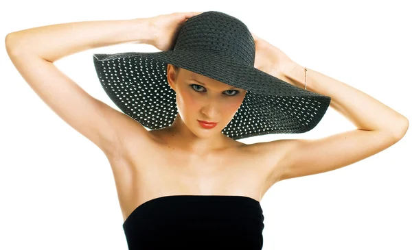 Beautiful women in black hat — Stock Photo, Image