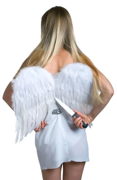Дівчина відрізає білі крила ангела — стокове фото
