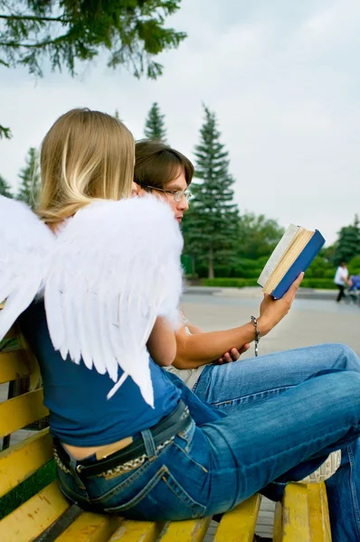 Young men and angel 3 — Stock Photo, Image