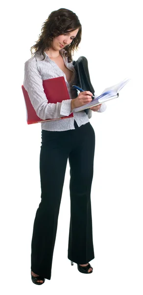 Young women makes entry in the document — Stock Photo, Image